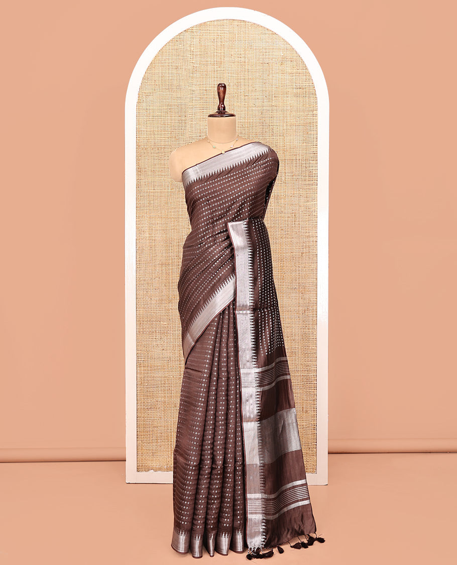 Brown Banana Pith Saree, Richly Detailed with Diamond Buttas All Over Its Body, Subtle Temple Zari Border, Pallu Steeped with Stripes, and Paired with a Matching Blouse