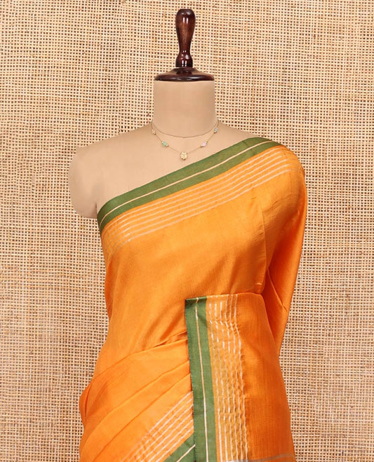 Yellow Plain Banana Pith Saree, Subtle Striped Contrast Border, Pallu of Gleaming Zari Stripes, and Paired with a Matching Blouse