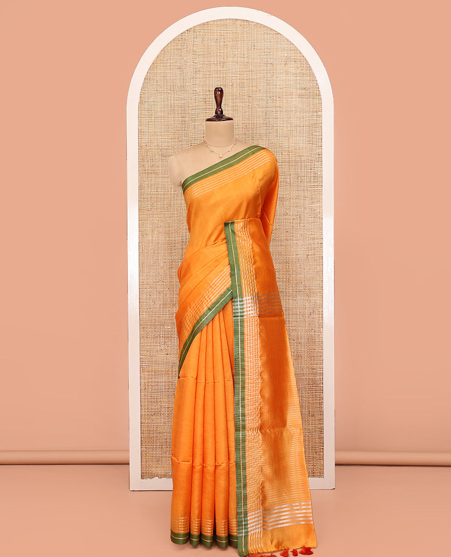 Yellow Plain Banana Pith Saree, Subtle Striped Contrast Border, Pallu of Gleaming Zari Stripes, and Paired with a Matching Blouse