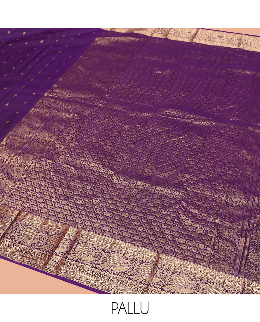 Violet Vasundhara Silk Saree Graced with Zari Buttas All Over Its Body, Highlighted by a Zari Border of Kathir, Mayil, Kann, Thilakam, Mayil, and Kamalam Designs, Grand Pallu of Geometric Patterns, and Paired with a Matching Blouse