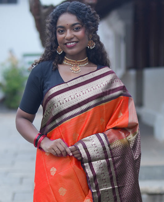 Reddish Orange-Coffee Brown Budget Silk Saree Features Vaira Oosi and Zari Buttas, Contrast Traditional Peacock Border, Jaal Pallu, and a Contrast Blouse