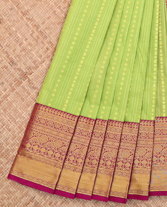 Parrot Green Budget Silk Saree, Detailed with Buttas and Stripes All Over Its Body, Complemented by a Contrast Traditional Zari Design Border, Grand Pallu, and Paired with a Contrast Blouse