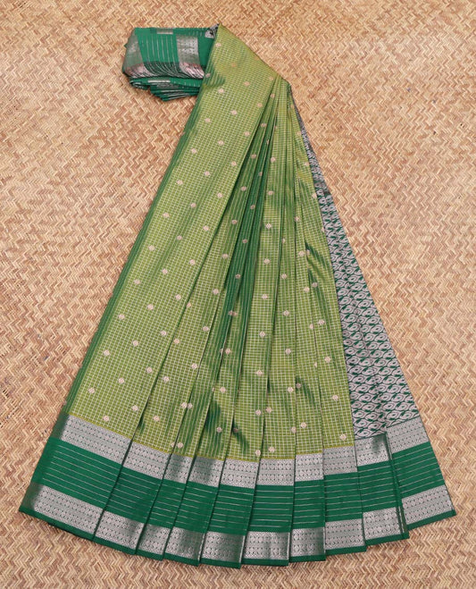 Green Budget Silk Saree, Dazzled with Zari Buttas and Stripes on Its Body, Complemented by a Contrast Traditional Zari Design Rettai Pettu Border, Intricately Designed Pallu, and Paired with a Contrast Blouse
