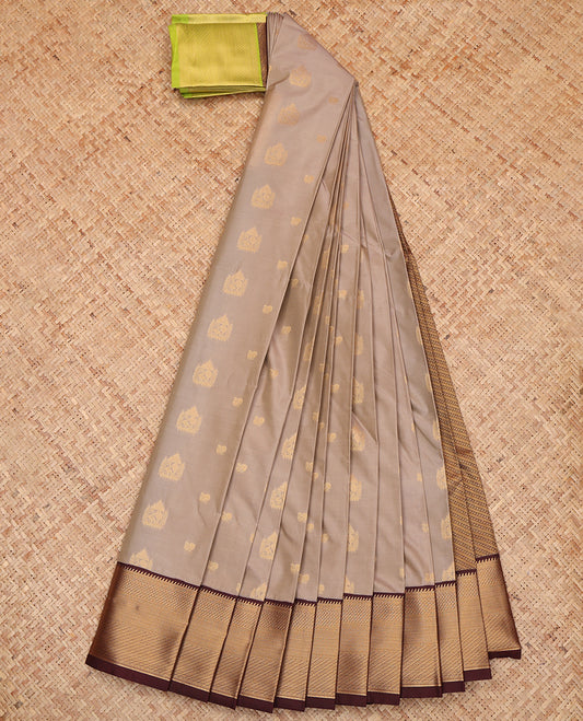Grey Budget Silk Saree, Subtly Sparkled with Zari Buttas, a Contrast Traditional Ganga-Jamuna Border, Intricate Pallu, and a Contrast Blouse