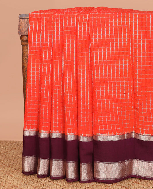 Red zari checked assam silk saree, contrast traditional zari design border, and zari design pallu