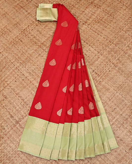 Red Budget Silk Saree, Richly Detailed with Zari Buttas All Over Its Body, Complemented by a Contrast Traditional Zari Design Rettai Pettu Border, Gleaming Zari-Woven Jaal Pallu, and Paired with a Contrast Blouse