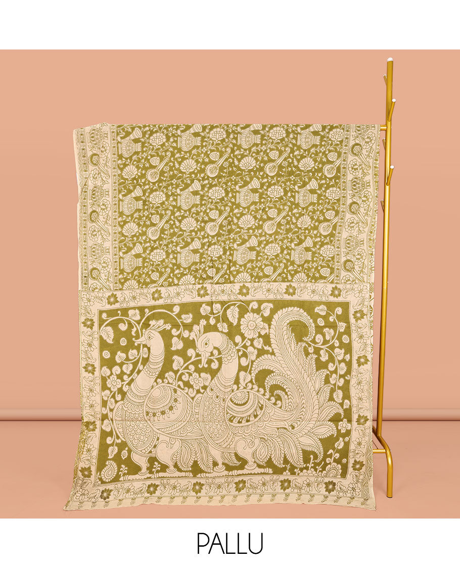 Green Machine-Printed Kalamkari Cotton Saree, Adorned with Floral and Floral Vase on Its Body, Subtly Printed Border, Pallu of Peacock Print, and Paired with a Printed Blouse