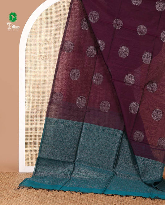 Borderless purple silk cotton saree with circular-shaped zari buttas, contrast pallu of floral creeper & jaal design