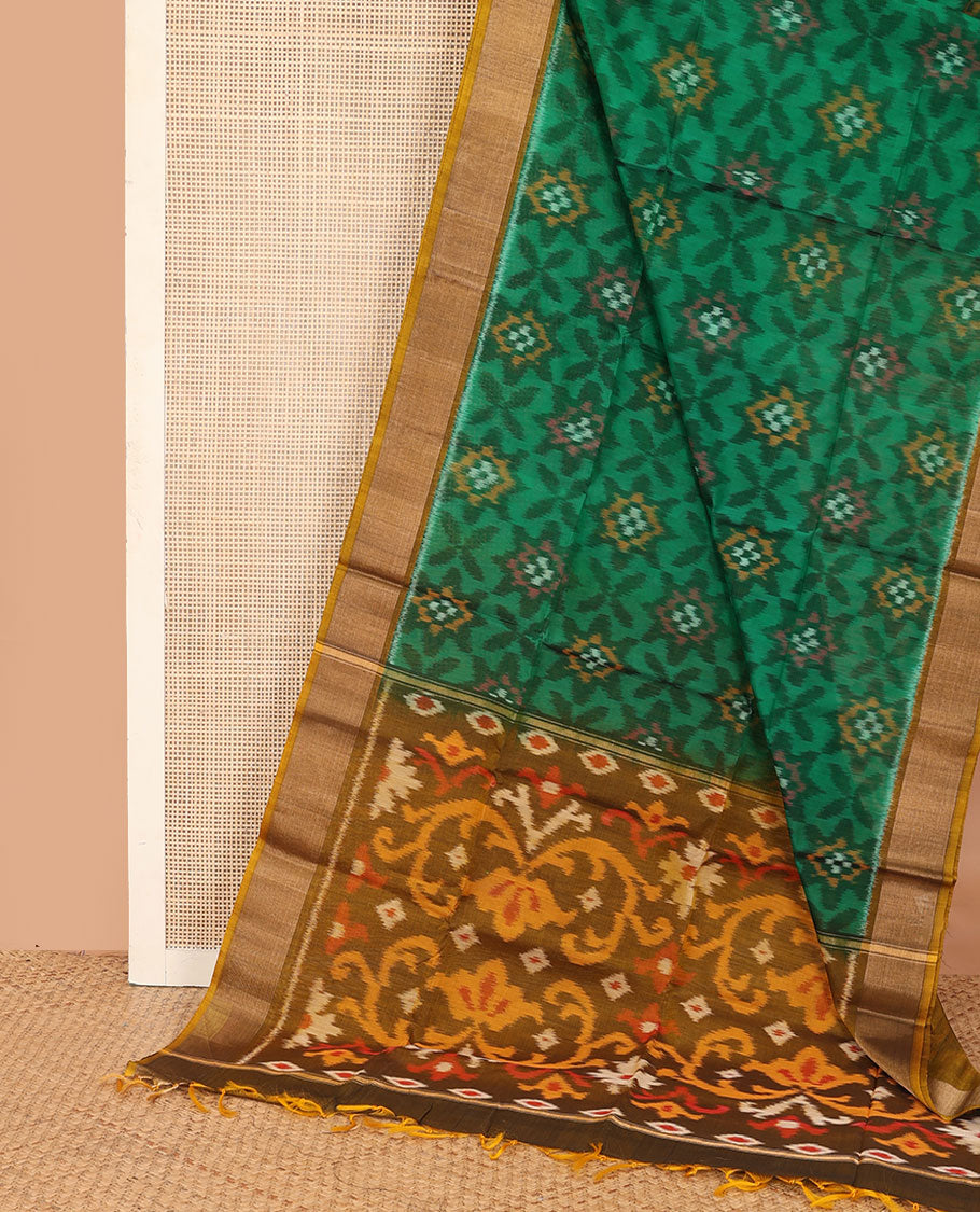 Green ikkat floral patterned silk cotton saree, contrast bavanji border, and pallu of ikkat Mughal style design weave