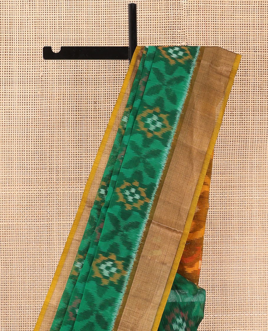 Green ikkat floral patterned silk cotton saree, contrast bavanji border, and pallu of ikkat Mughal style design weave