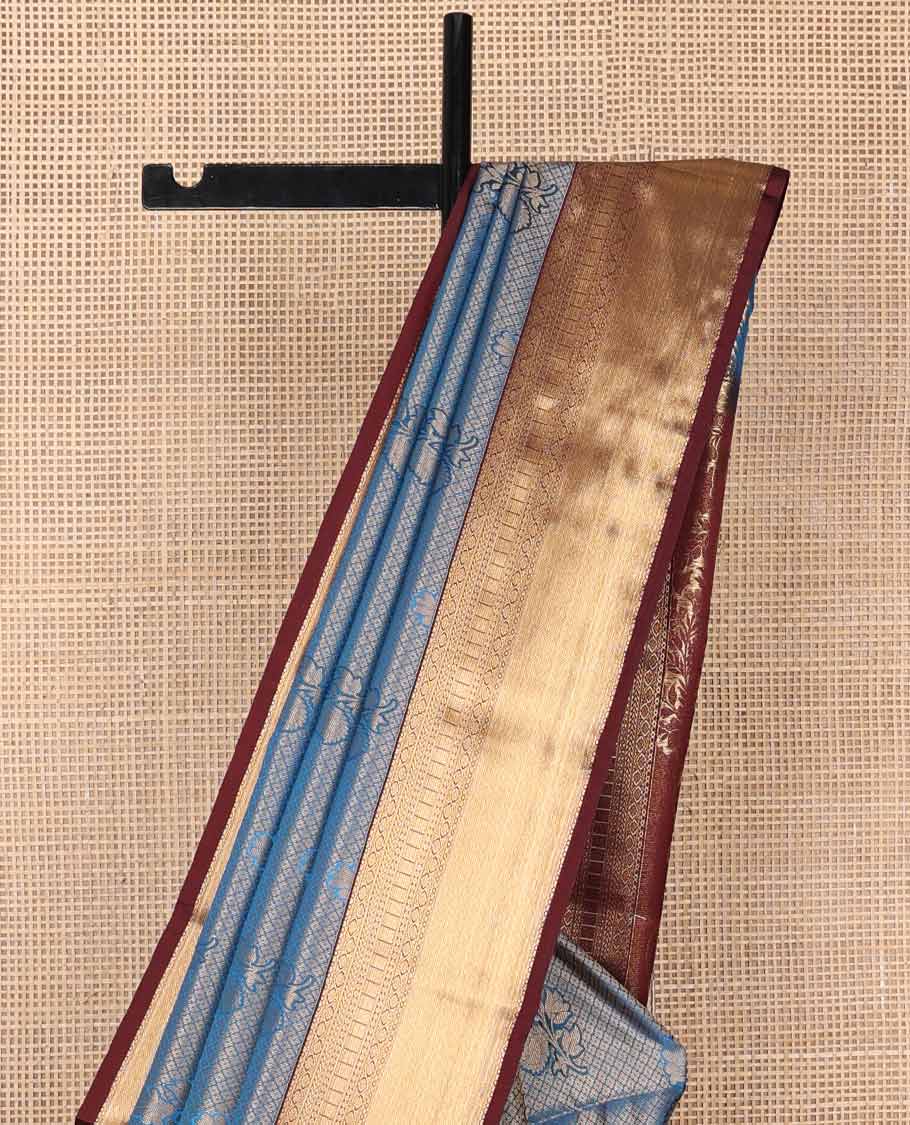 Blue checked, floral motifs soft silk saree with contrast zari design border & floral design pallu