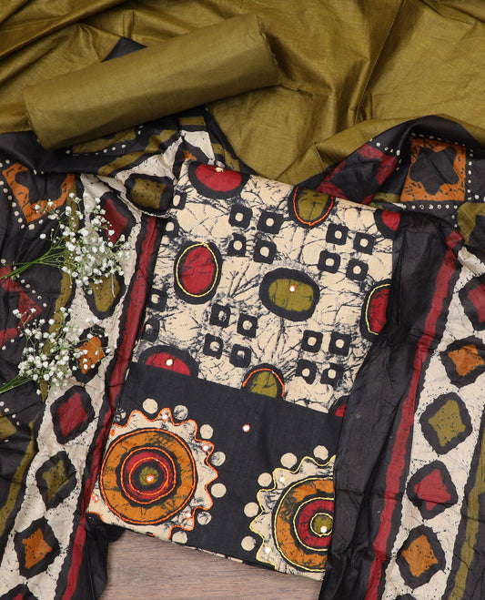 Black cotton material chudidar set, batik style geometric printed with mirror work top, contrast green plain bottom and batik printed dupatta