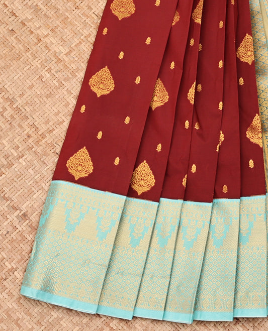 Brown Budget Silk Saree, Gleamed up with Zari Buttas All Over Its Body, Complemented by Contrast Traditional Zari Designs Woven Border, Grand Jaal Pallu and Paired with a Contrast Blouse