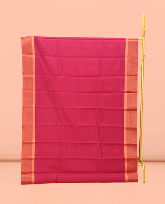 Red Semi-Silk Cotton Saree, Steeped with Zari Buttas on Its Body, Complemented by Contrast Border, Pallu Features Intricate Designs, and Paired with a Matching Blouse