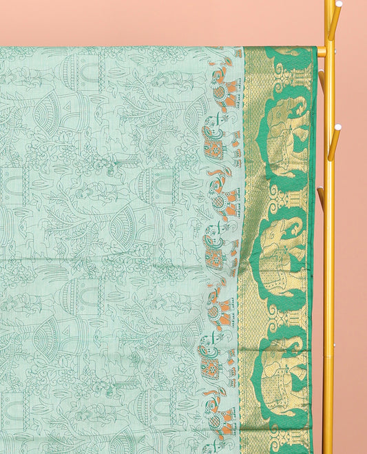 Green Andhra Cotton Saree, Beautified with Village-Themed Print, a Contrast Elephant Zari Border, a Pallu of Patola-Print, and a Matching Blouse