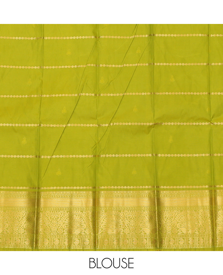 Green Budget Silk Saree, Decked Up with Zari Buttas and Stripes, Complemented by Traditional Zari Border, a Jaal Pallu and a Contrast Blouse
