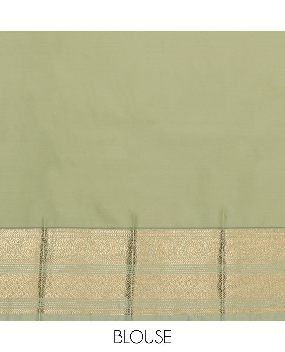 Green Budget Silk Saree Featuring Zari Buttas, a Contrast Traditional Zari Border, Grand Pallu, and a Contrast Blouse