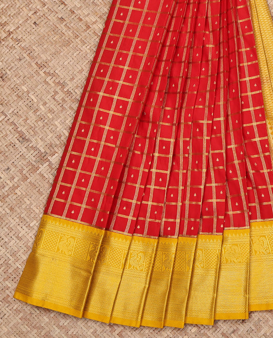 Red Budget Silk Saree, Spotlighted with Zari Butta Enclosed Checked Design on Its Body, Complemented by a Contrast Traditional Zari Design Border, Grand Jaal Pallu, and Paired with a Contrast Blouse