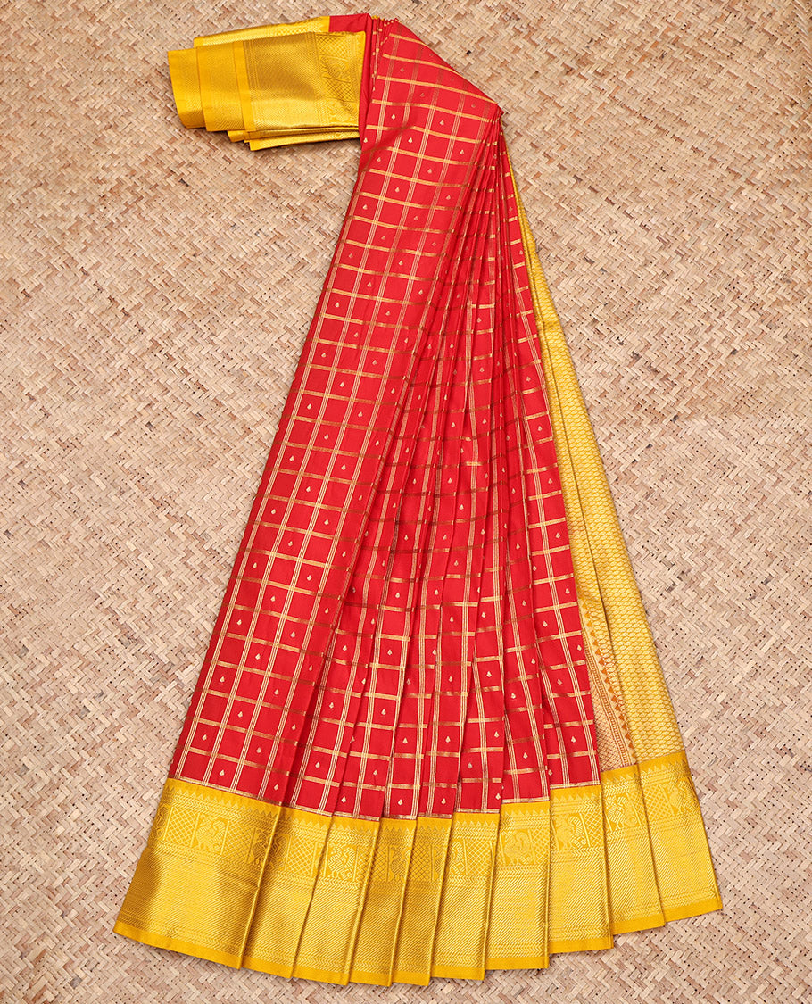 Red Budget Silk Saree, Spotlighted with Zari Butta Enclosed Checked Design on Its Body, Complemented by a Contrast Traditional Zari Design Border, Grand Jaal Pallu, and Paired with a Contrast Blouse