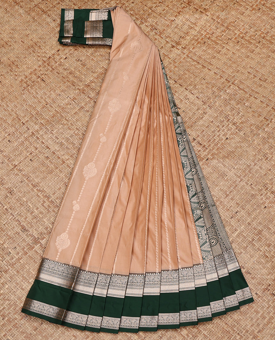 Fawn Brown Budget Silk Saree, Accentuated with Zari Buttas All Over Its Body, Complemented by a Contrast Traditional Zari Design Rettai Pettu Border, Intricate Pallu, and Paired with a Contrast Blouse