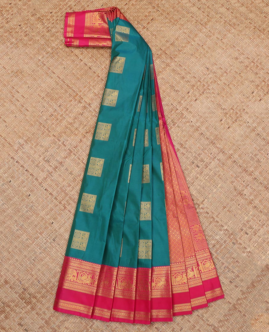 Green Budget Silk Saree, Highlighted with Peacock-Chakra Buttas, a Contrast Traditional Zari Rettai Pettu Border, a Grand Pallu and a Contrast Blouse