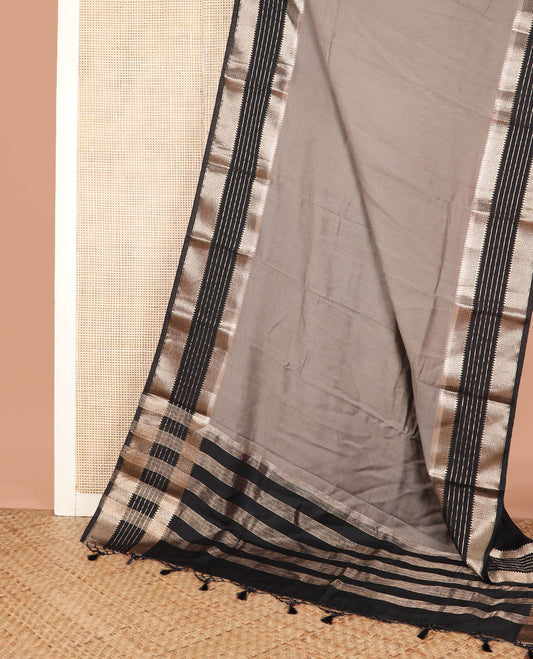 Grey plain assam silk saree, contrast traditional zari design border, and zari design pallu