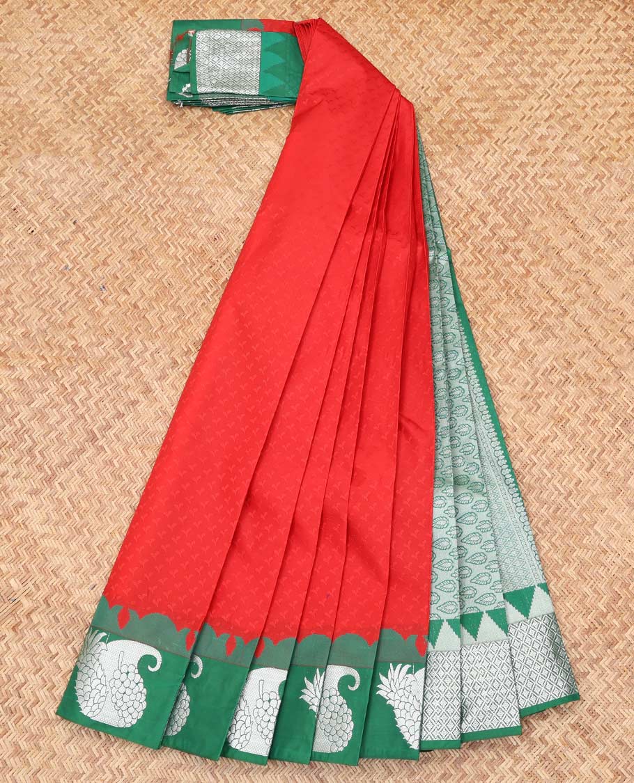Red Embossed Budget Silk Saree, Complemented by Contrast Fruit Zari Border, a Grand Pallu and a Contrast Blouse