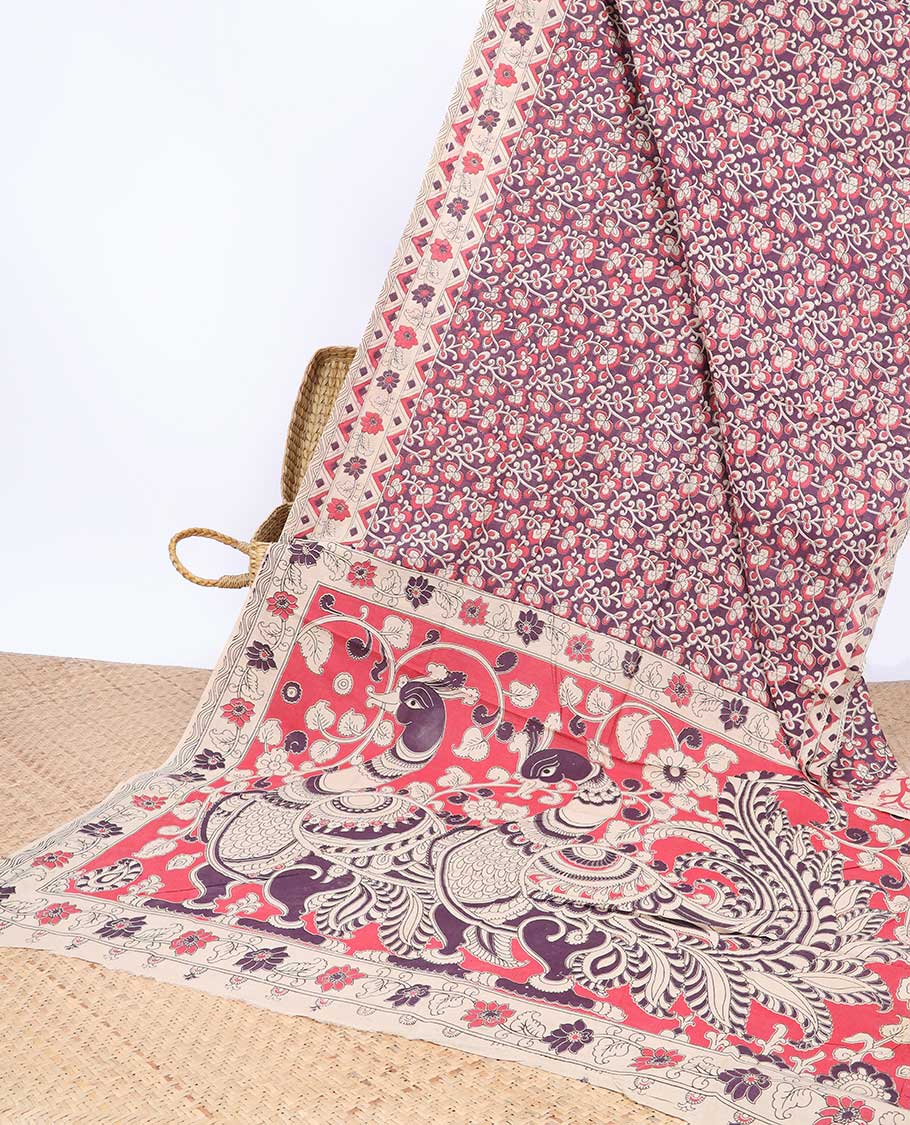 Purple floral machine-printed kalamkari cotton saree, contrast floral & geometric border & peacock pallu