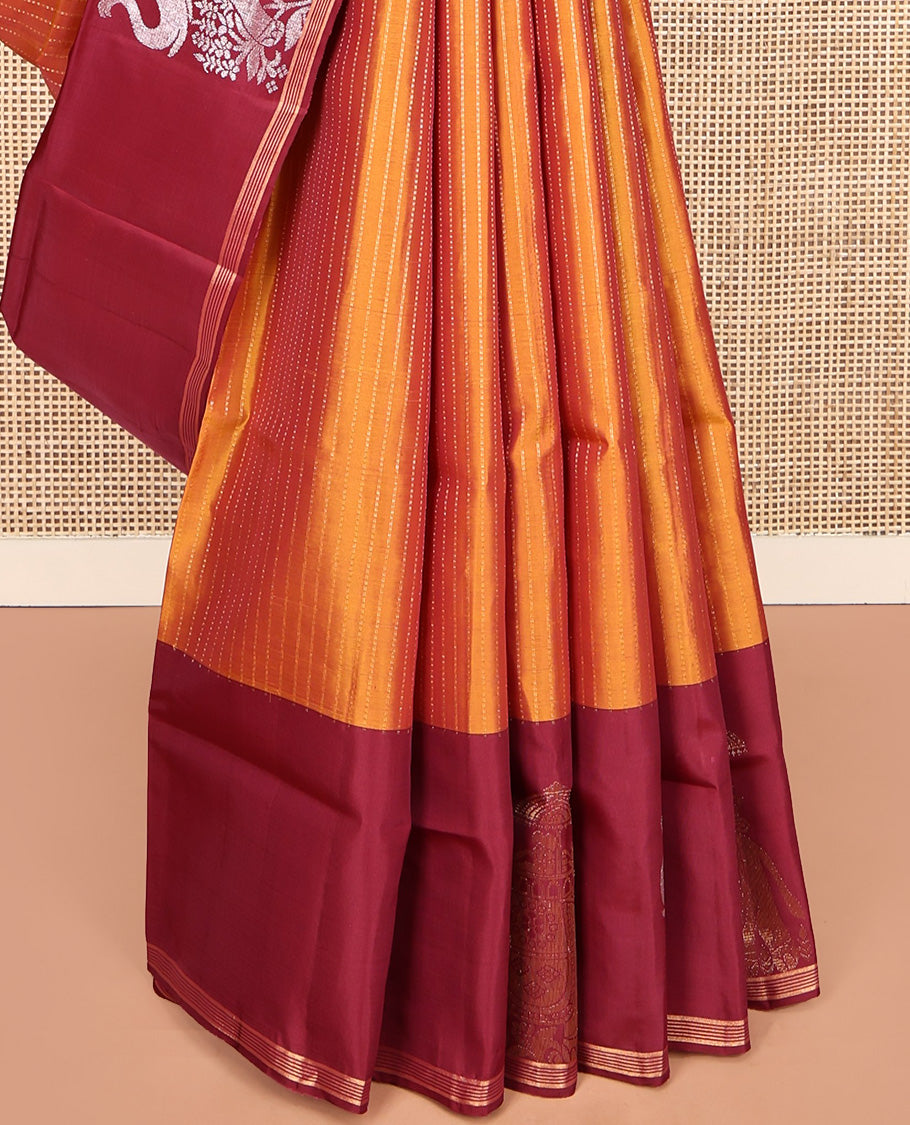Orange Mayuri Lite Silk Mix Saree, Beautified with Muthu Stripes All Over Its Body, Complemented by a Contrast Border of Yaanai Designs, Pallu of Intricate Designs, and Paired with a Contrast Blouse