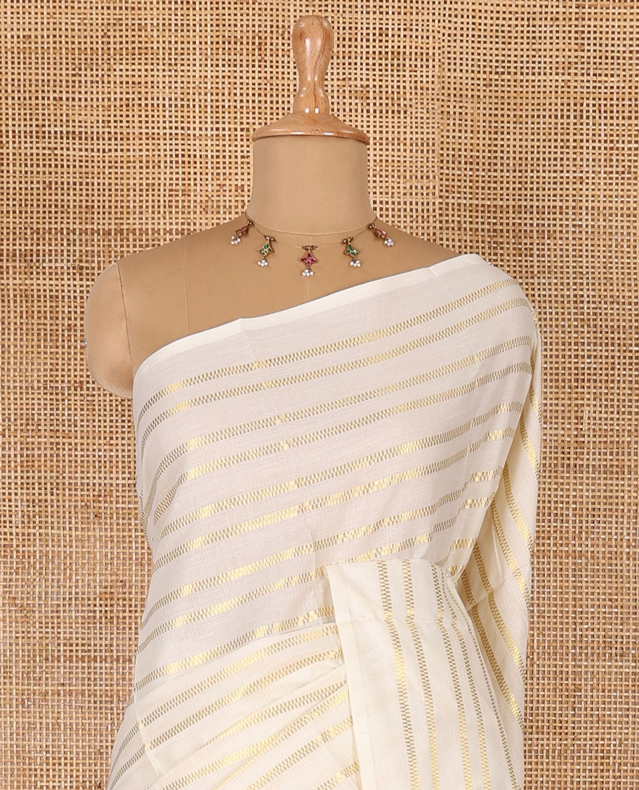 Borderless cream and maroon horizontal zari muthu striped Kerala cotton saree, self-pallu with tassels and a matching blouse