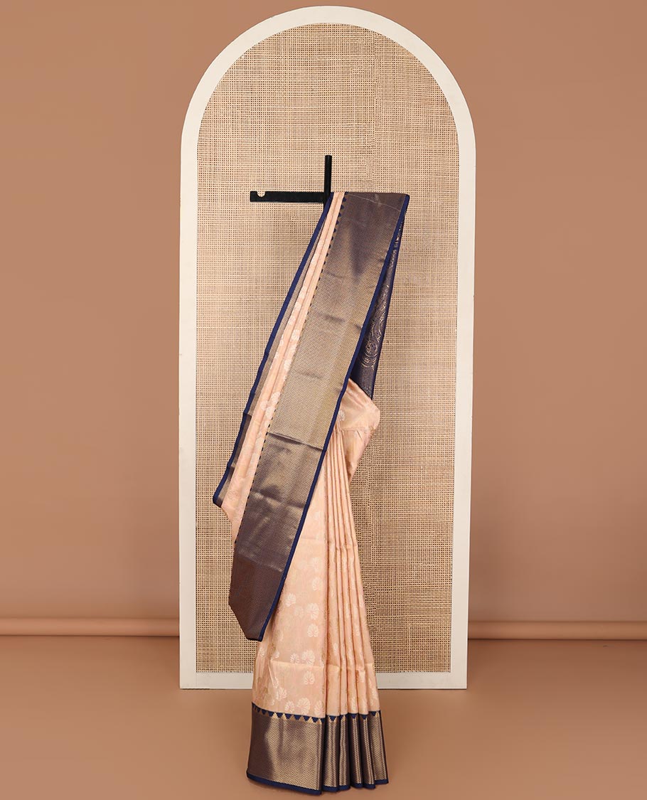 Peach floral design soft silk saree with contrast temple, checked border & floral design pallu