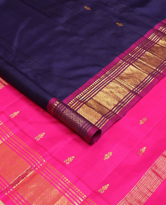 Navy blue zari buttas Kanchipuram silksaree, contrast one-sided border of panner sombu,banaras,muthu & jaal design & floral design pallu