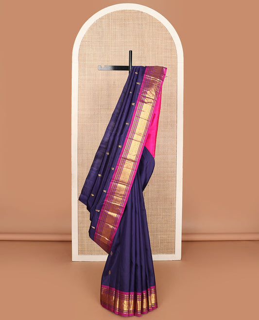 Navy blue zari buttas Kanchipuram silksaree, contrast one-sided border of panner sombu,banaras,muthu & jaal design & floral design pallu