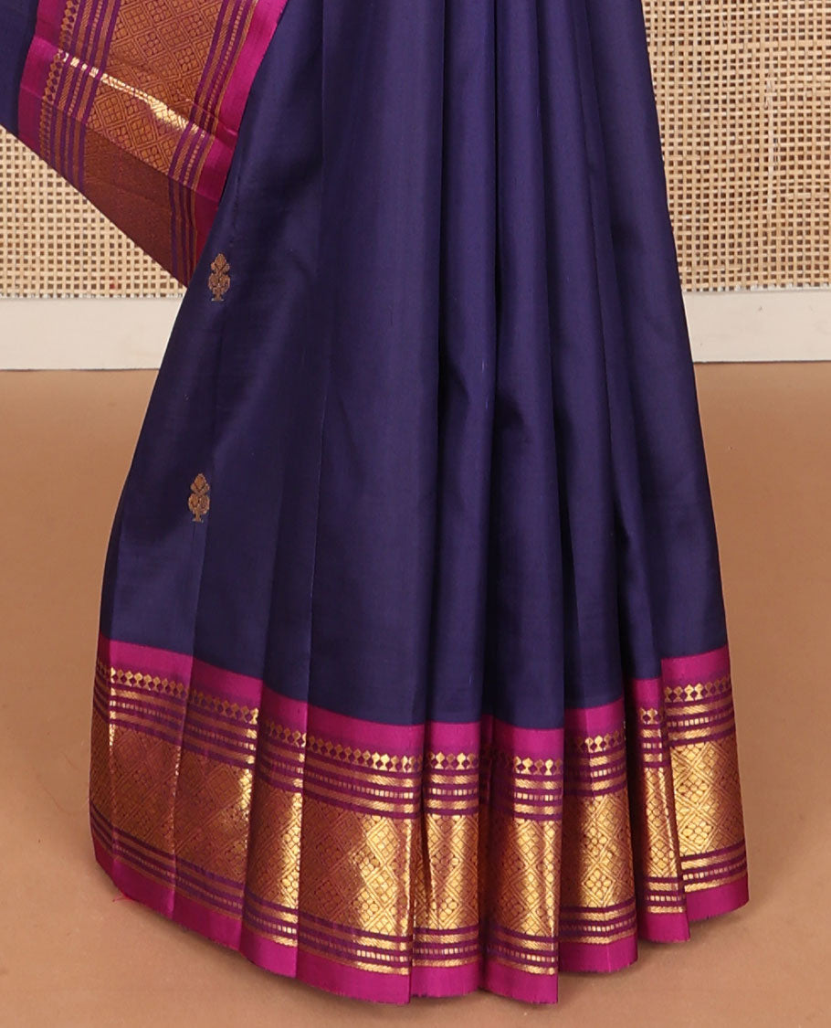 Navy blue zari buttas Kanchipuram silksaree, contrast one-sided border of panner sombu,banaras,muthu & jaal design & floral design pallu