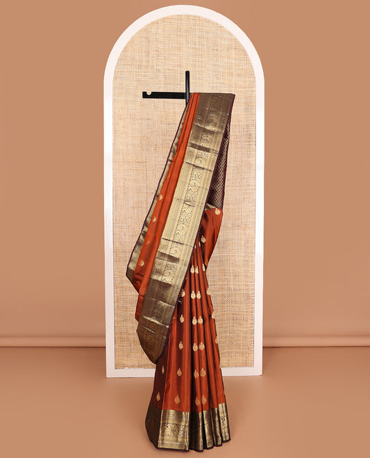 Orange zari buttas Vasundhara silk mix saree, contrast border of thilakam, neli, kathir, kodi visiry, and mayil and jaal pallu