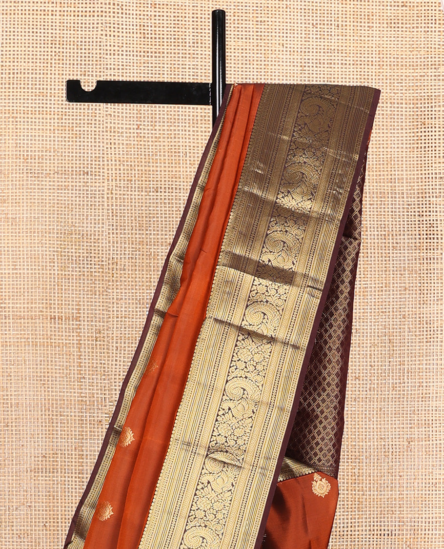 Orange zari buttas Vasundhara silk mix saree, contrast border of thilakam, neli, kathir, kodi visiry, and mayil and jaal pallu