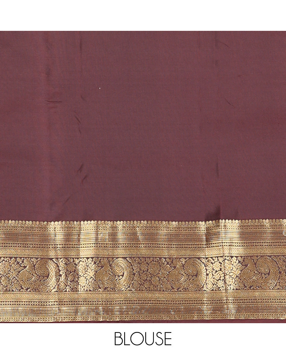 Orange zari buttas Vasundhara silk mix saree, contrast border of thilakam, neli, kathir, kodi visiry, and mayil and jaal pallu