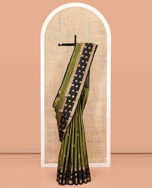 Green Vasundhara Lite Silk Mix Saree, Woven with Zari Buttas All Over Its Body, Complemented by Contrast Border of Rekku, Mayil, and Chakram Designs, Checked Pallu, and Paired with a Contrast Blouse