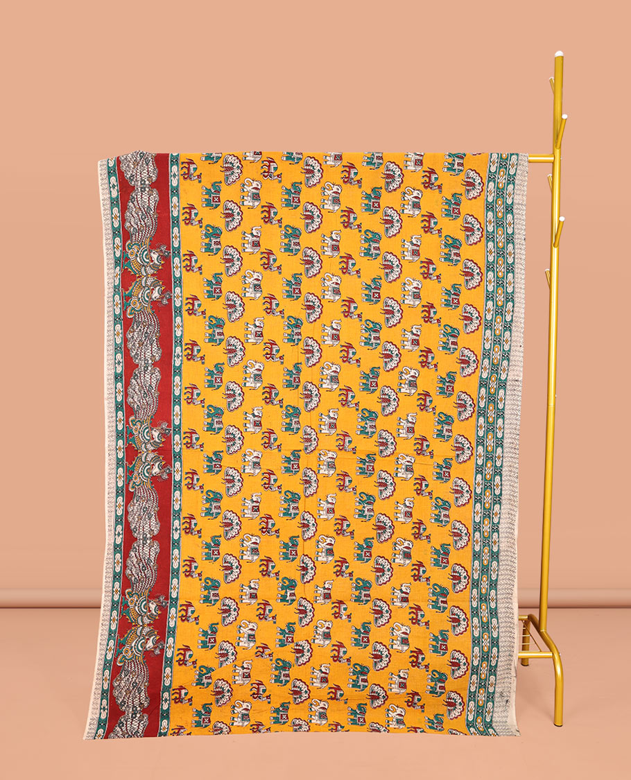 Orange Machine-Printed Kalamkari Cotton Saree, Accentuated with Peacock, Elephant, and Camel Motifs  on Its Body, Complemented by a Contrast Border of Peacock Print, Pallu of Leaf Print, and Paired with a Printed Blouse