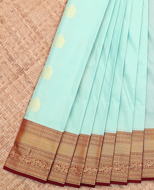 Blue Budget Silk Saree, Sparsely Sparkled with Micro-Checks and Buttas All Over Its Body, Complemented by a Contrast Traditional Zari Design Border, Pallu of Intricate Designs, and Paired with a Contrast Blouse