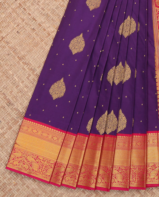 Violet Budget Silk Saree, Dazzled with Zari Buttas All Over Its Body, Complemented by a Contrast Traditional Design Border of Peacocks, Gracefully Embellished Pallu, and Paired with a Contrast Blouse