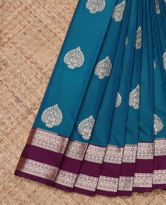Blue Budget Silk Saree, Decorated with Zari Buttas All Over Its Body, Complemented by a Contrast Traditional Zari Design Rettai Pettu Border, Intricate Pallu, and Paired with a Contrast Blouse
