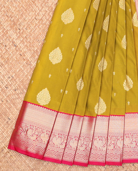 Green Budget Silk Saree, Adorned with Zari Buttas All Over Its Body, Complemented by Captivating Contrast Traditional Zari Designs Woven Border, Grand Pallu and Paired with a Contrast Blouse