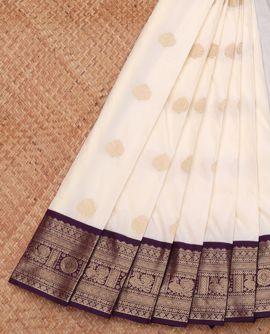 Off-White Budget Silk Saree, Enthralled with Zari Buttas, Complemented by a Contrast Traditional Zari Border, Grand Pallu, and a Contrast Blouse