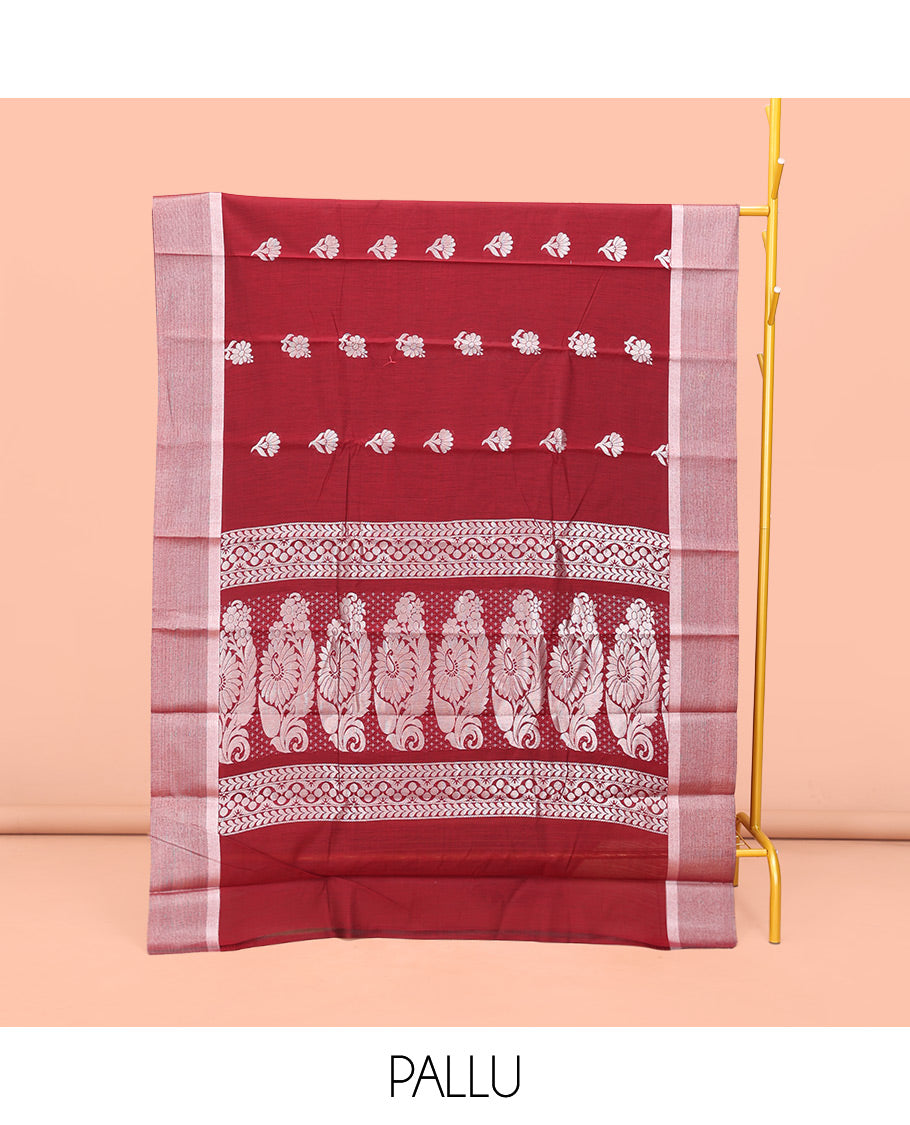 Red Semi-Silk Cotton Saree, Elegantly Highlighted with Floral Zari Buttas on Its Body, Highlighted by a Self-Border, Pallu Features Floral Designs, and Paired with a Matching Blouse