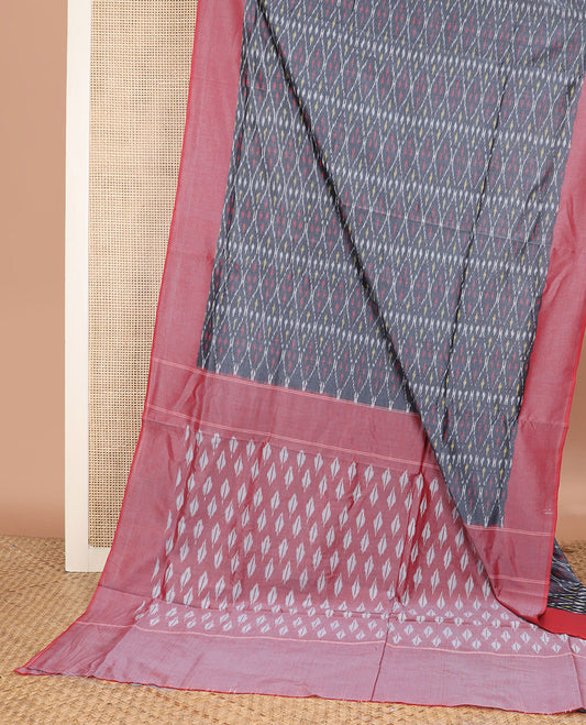 Grey Ikkat Cotton Saree Subtly Sparkled with Ikkat Buttas, Complemented by a Contrast Plain Border, and Pallu of Ikkat Patterns
