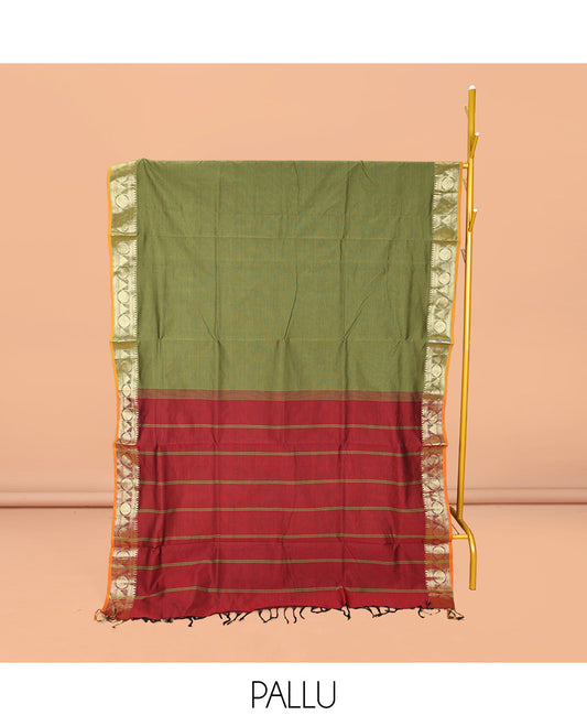 Green Plain Poly Cotton Saree, Complemented by a Contrast Traditional Zari Border of Temple and Rudraksham Designs, Contrast Striped Pallu, and Paired with a Contrast Blouse