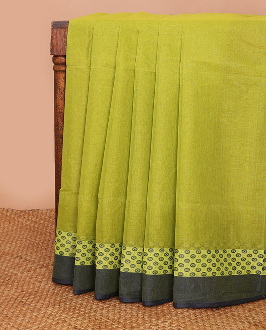Green plain Bengal cotton saree, contrast border of circle motifs & pallu of stripes