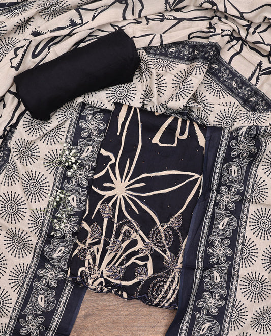 Black Material Chudidar Set, Artfully Detailed with Abstract Print and Floral Embroidered Cotton Top, a Plain Cotton Bottom, and Paired with Intricately Printed Cotton Dupatta
