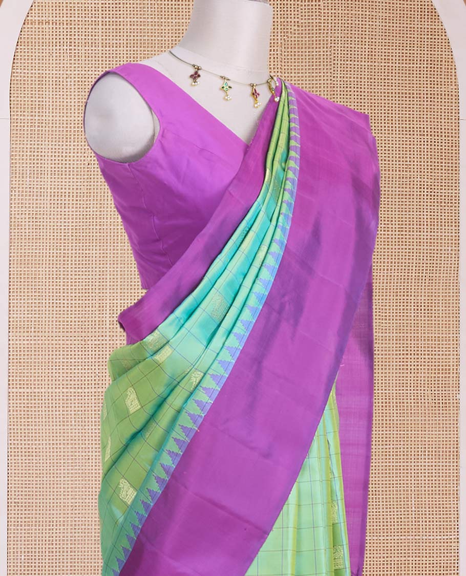 Green butta enclosed checked gadwal silk saree, contrast temple plain border & pallu steeped with horse & peacock buttas